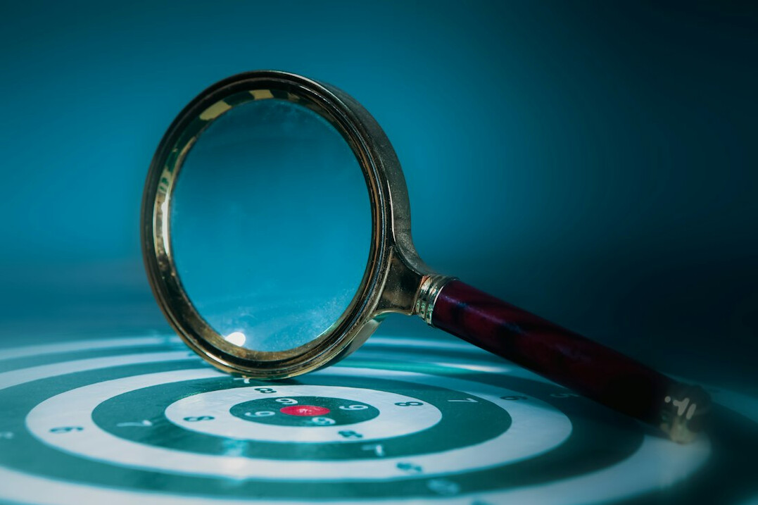 store detective monitoring customers