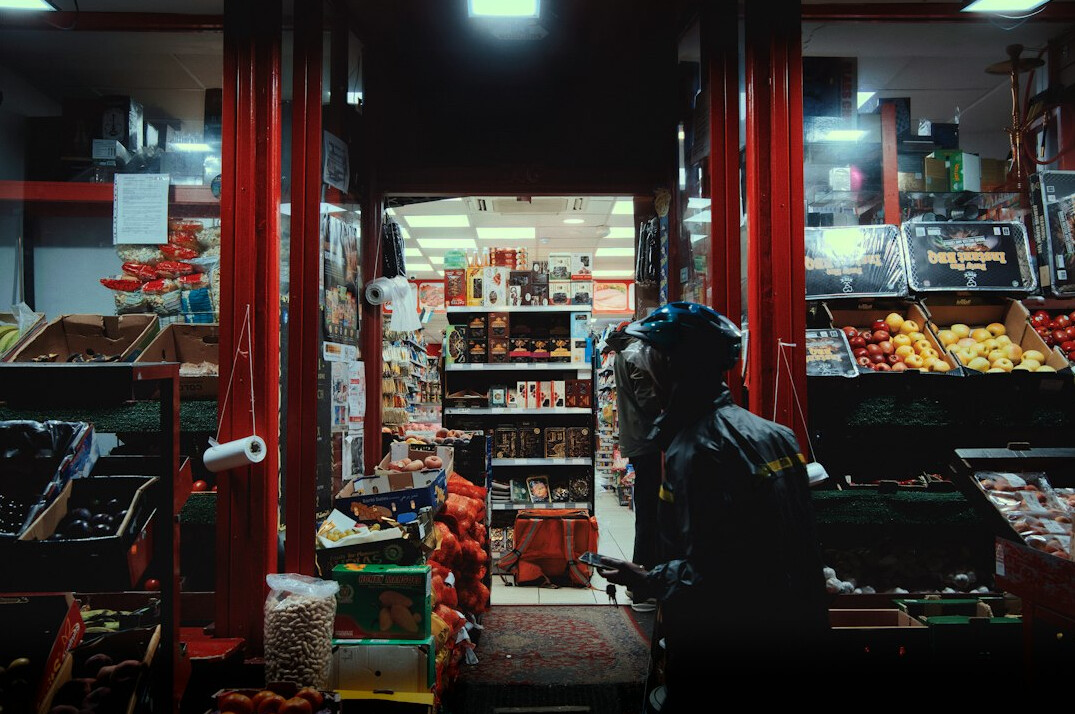 store detective catching thief