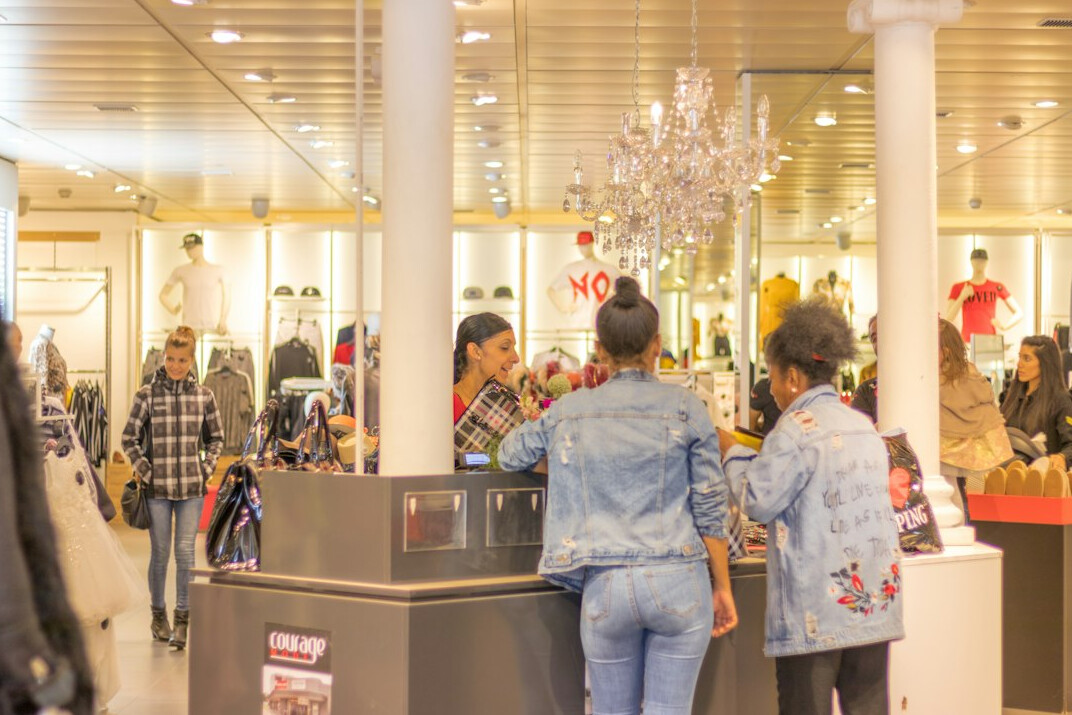 store detective monitoring shoppers