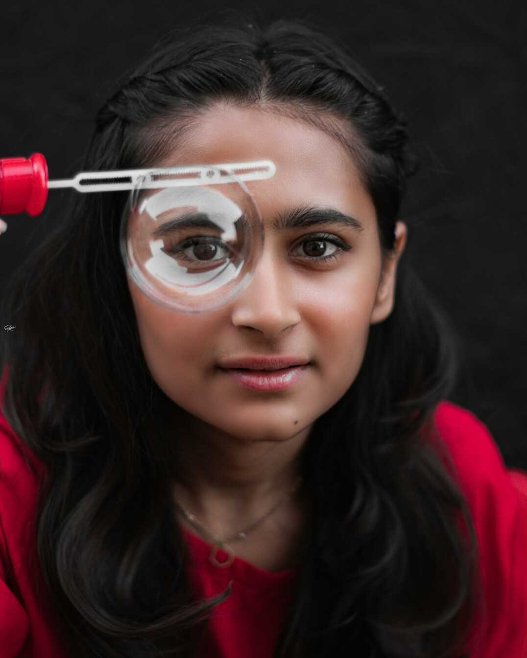 Professional studio portrait of a young Uruguayan woman researcher