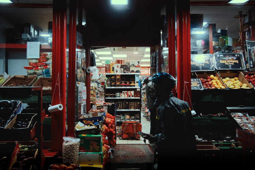 store security guard checking shelves